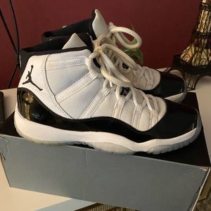 Air Jordan 11 Retro in 7 youth. Good condition.  Worn a few times.